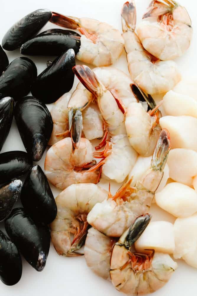 Mussels, shrimp and scallops cleaned and ready to cook.